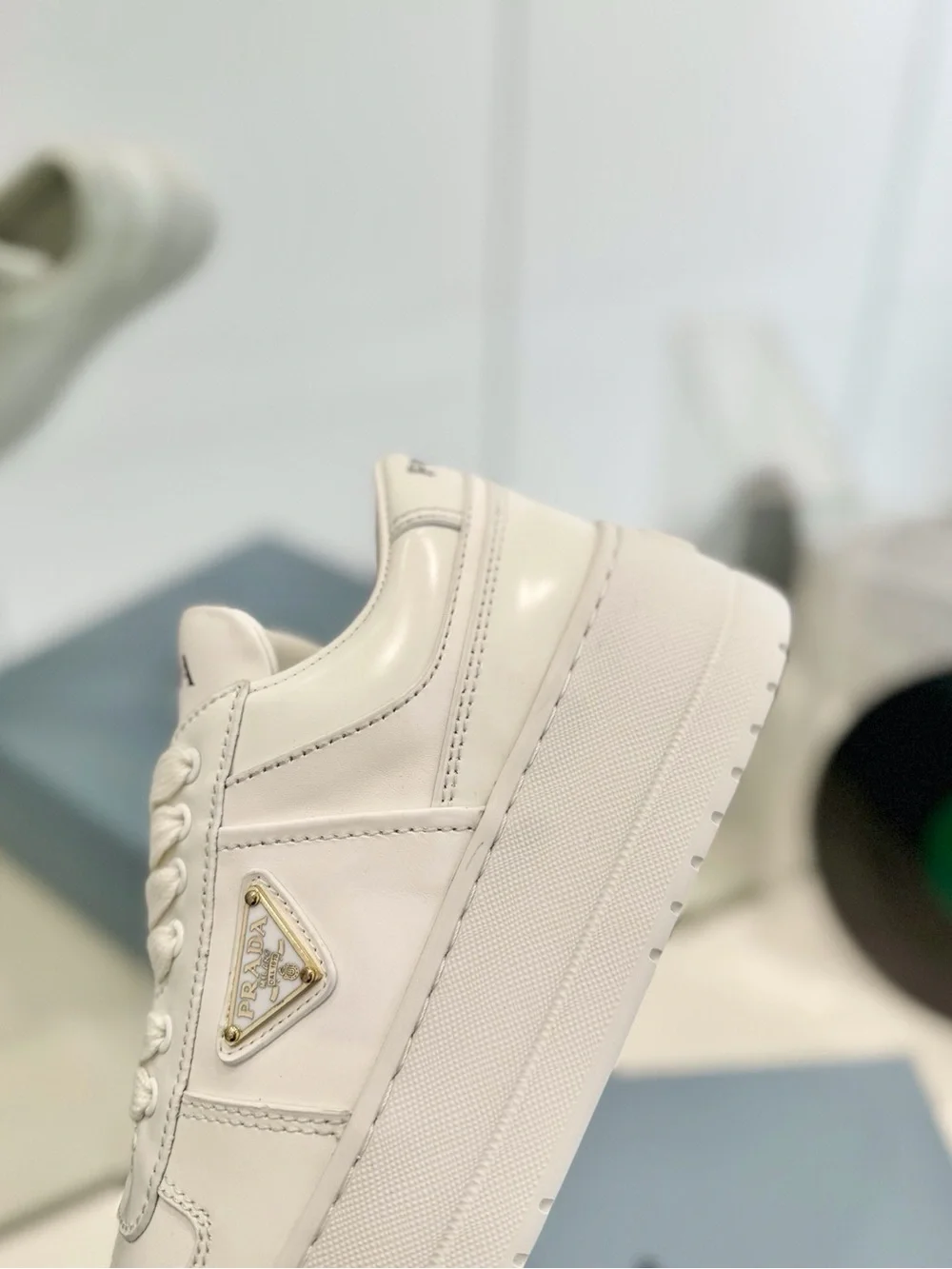 White Leather Platform Lace-Up Sneakers with Gold Triangle Accent